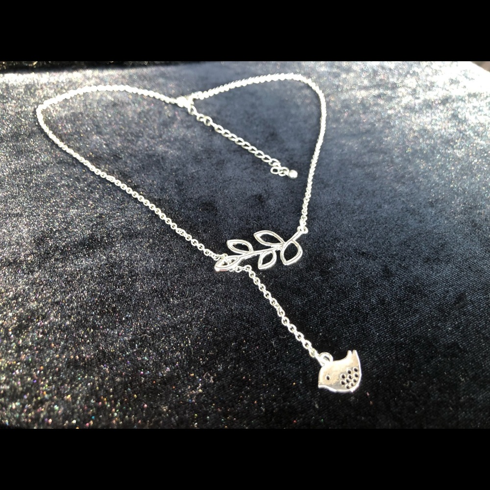Silver leaf and bird necklace
